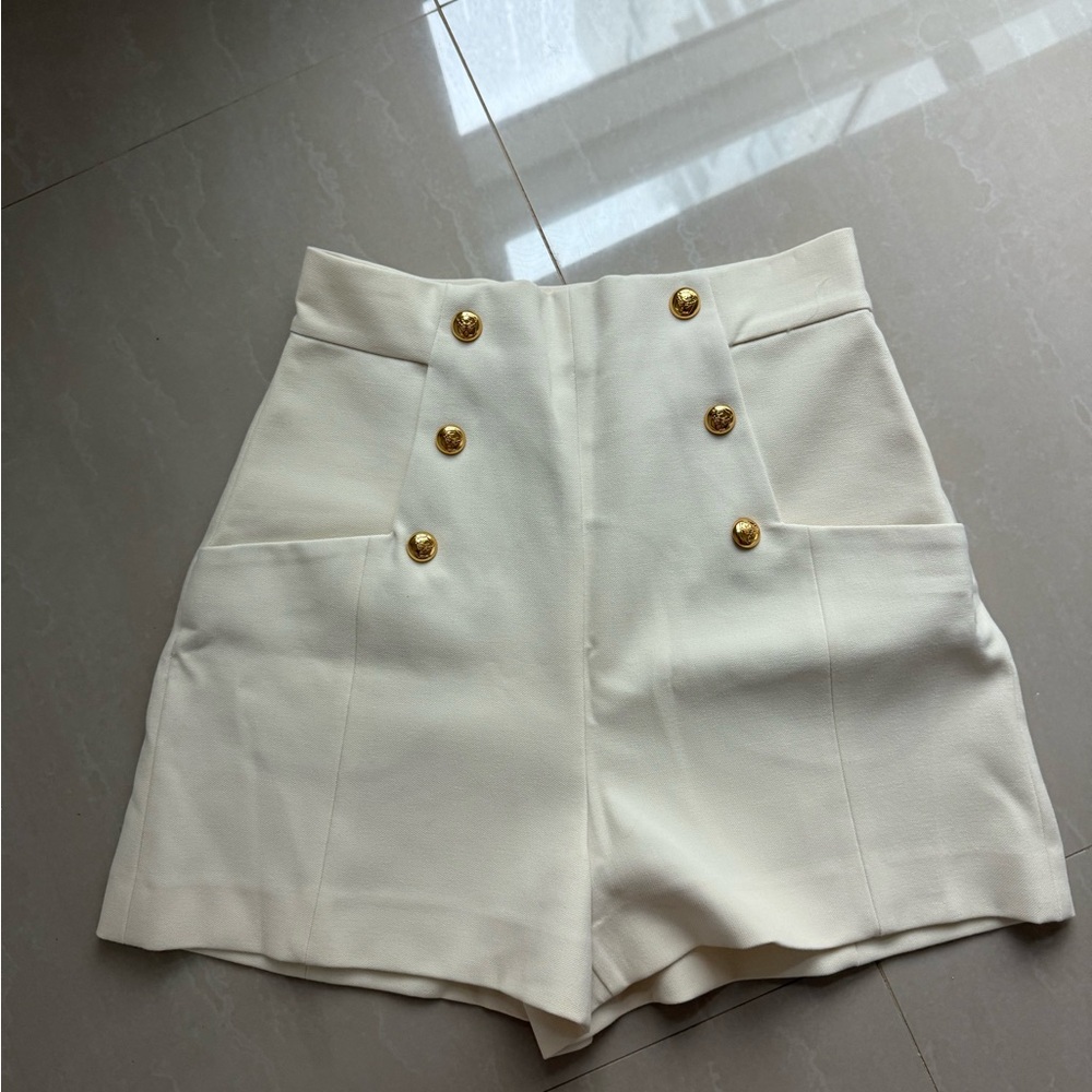 Zara white shorts with gold buttons